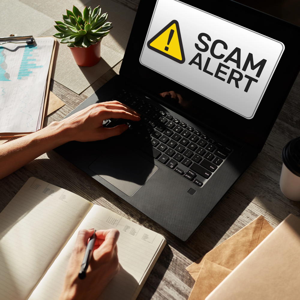 scam alert detecting warning. notification on device screen.